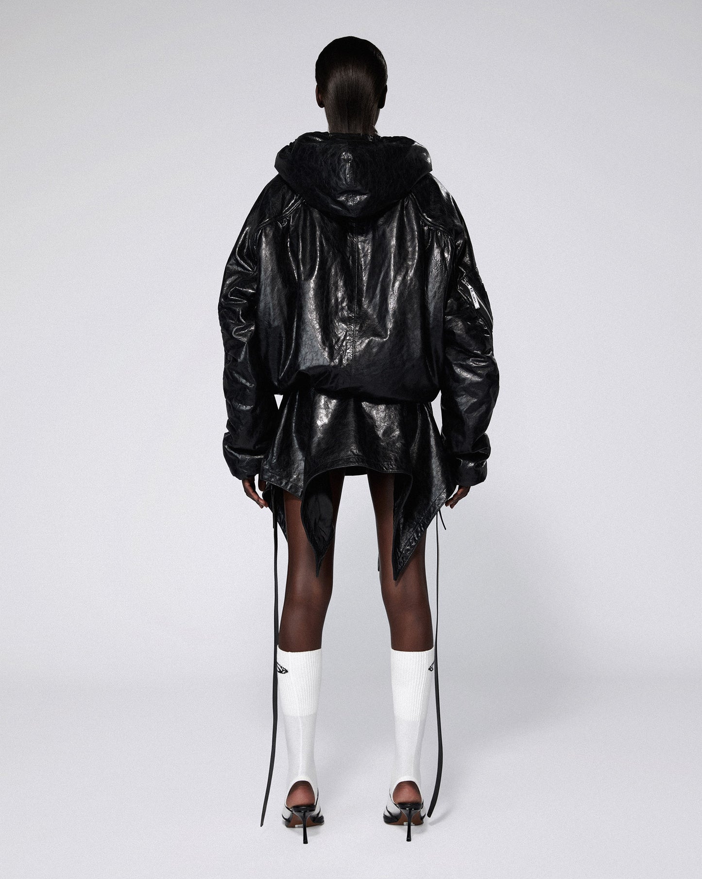 LEATHER SERPENTINE SKIRT BLACK